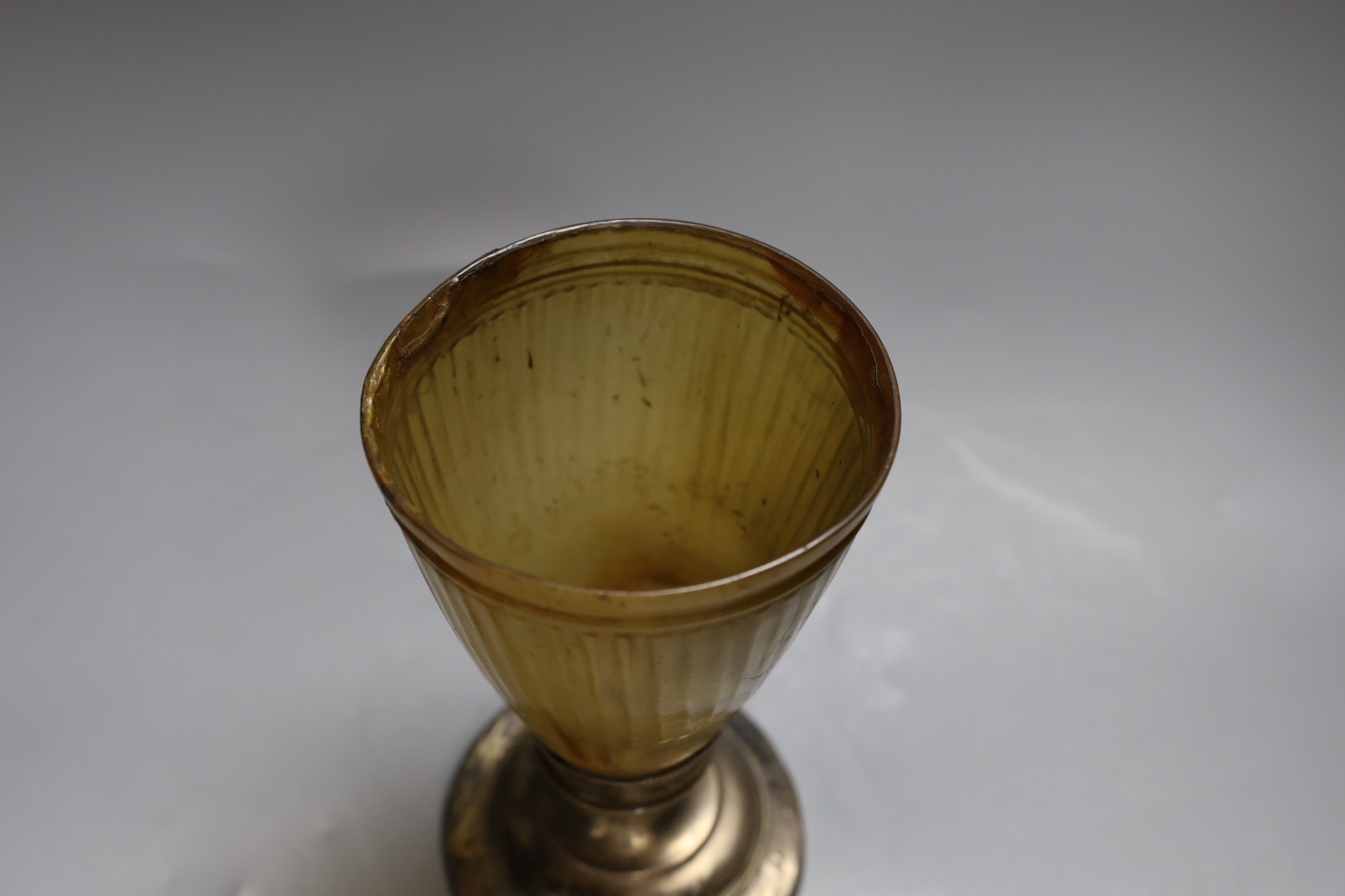 A 19th century and later horn and white metal chalice, 21cm tall